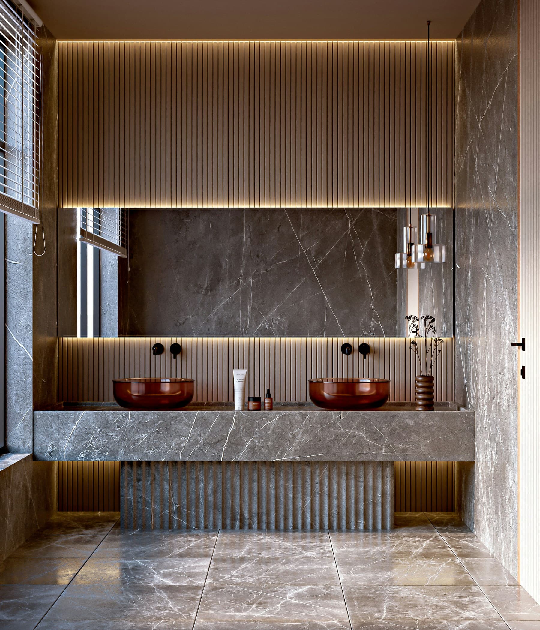 Sculptural stone vanity in a warm spa-like bathroom
